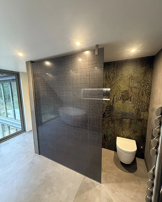 Custom glass partition and mosaic feature wall